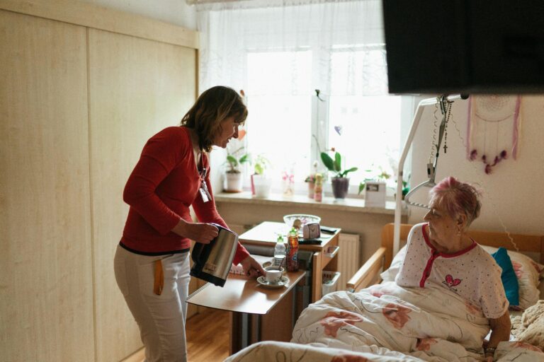 Family caregiver program — A-Team Home Care companion caregiver spending quality time with senior client at home in Philadelphia
