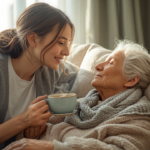 How to Help Seniors with Nausea — A-Team Home Care - A-TEAM #1 Home Care Agency in Philadelphia, PA A home caregiver offering comfort and warm care to an elderly senior woman experiencing nausea