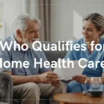 Elderly man and nurse on a sofa review paperwork about home health care in a living room setting.
